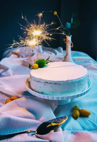 naked cake cake with sparkled candles 20th birthday cake
